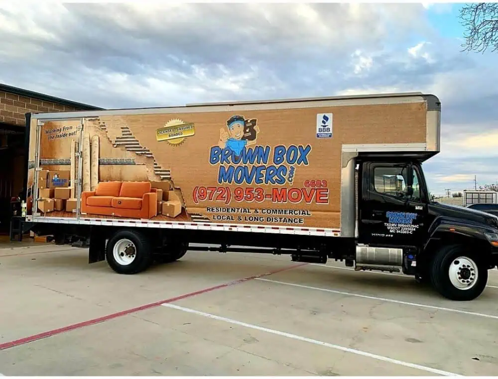 Brown Box Movers truck on a residential street