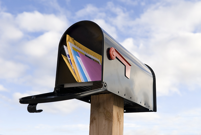 Mailbox stuffed with letters after an address change