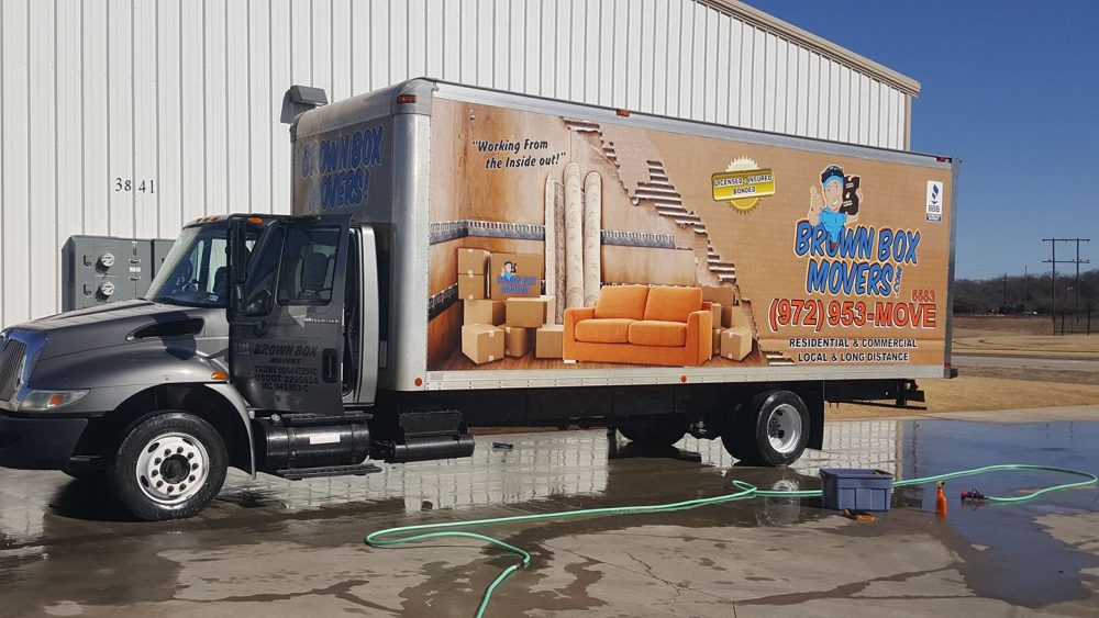 Brown Box Movers truck ready for a long-distance move