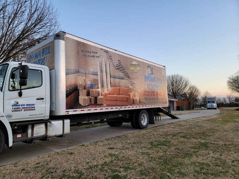 Brown Box Movers truck parked on a street